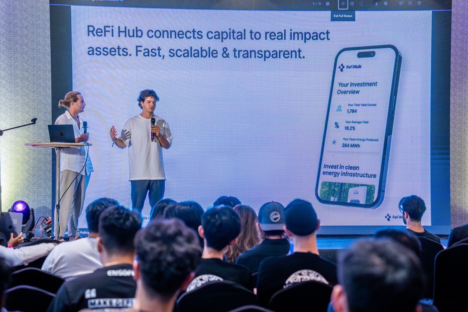 ReFi Hub presented on stage to a conference audience